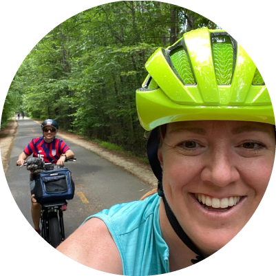 Selfie of people wearing helmets riding bikes